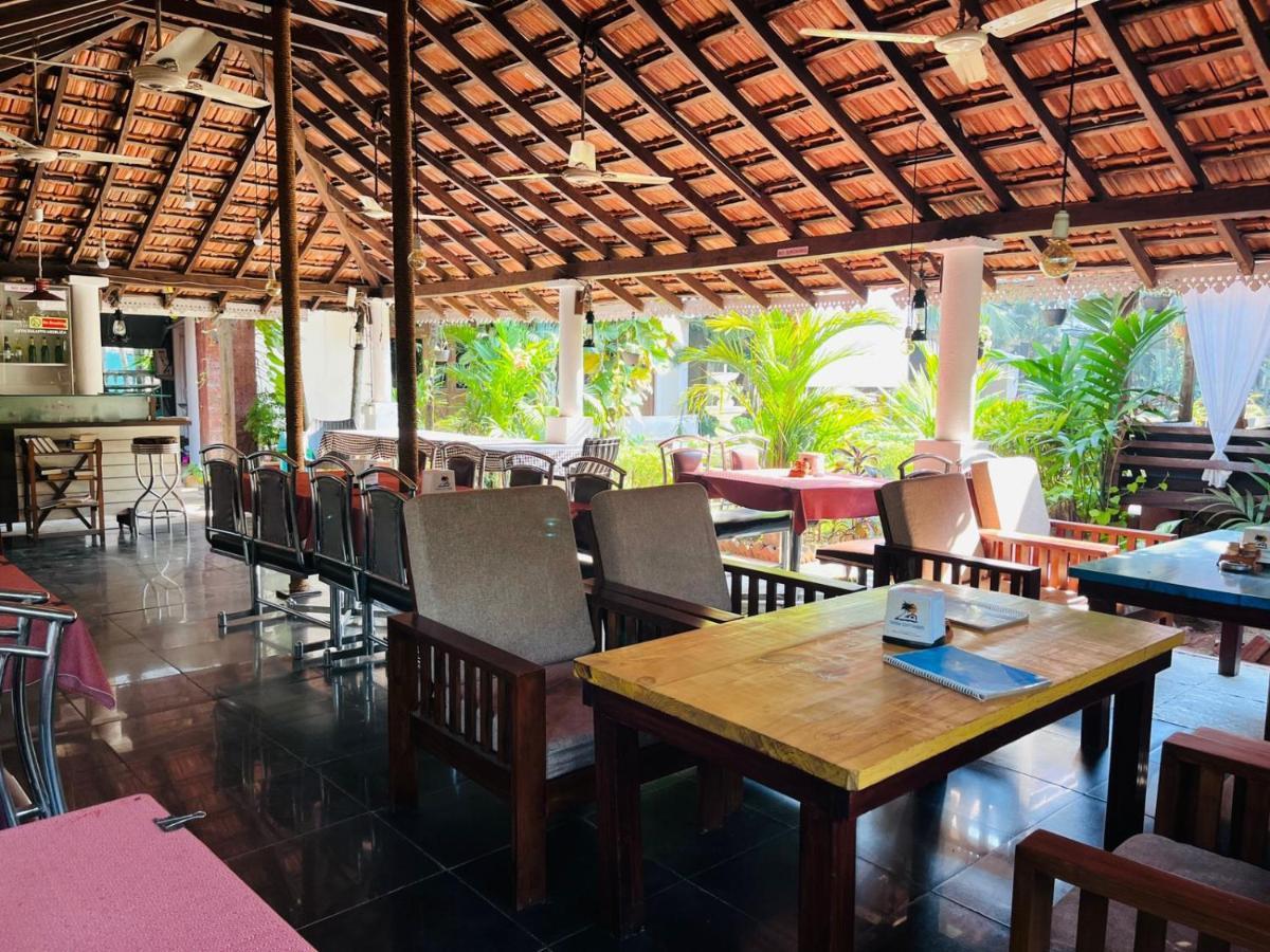 Naga Cottages Morjim Bagian luar foto